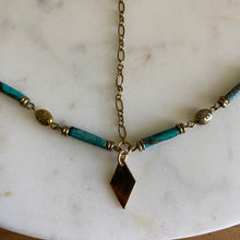 Load image into Gallery viewer, Close-up of Fauna beautiful head chain jewelry made from brass chains and recycled turquoise beads.