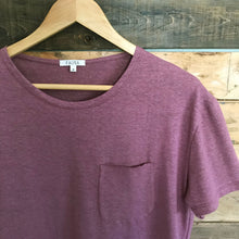 Load image into Gallery viewer, Close-up of FAUNA purple hemp and organic cotton mens tee featuring a raw edged pocket, curved hem, and round neck.