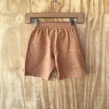 Load image into Gallery viewer, FAUNA Kids Rust Orange Sustainable Hemp Shorts featuring 2 front pockets, a comfortable crotch inset, a waistband with organic cotton rope to adjust to child's waist size, and lots of love to Mother Earth.