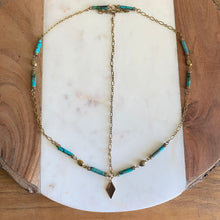 Load image into Gallery viewer, Fauna beautiful head chain jewelry made from brass chains and recycled turquoise beads.
