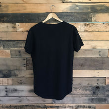 Load image into Gallery viewer, Back of FAUNA black hemp and organic cotton mens tee featuring a raw edged pocket, curved hem, and round neck. 
