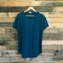 Load image into Gallery viewer, FAUNA blue hemp and organic cotton mens tee featuring a raw edged pocket, curved hem, and round neck. 
