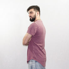 Load image into Gallery viewer, Male model wearing a Fauna purple hemp and organic cotton shirt. 
