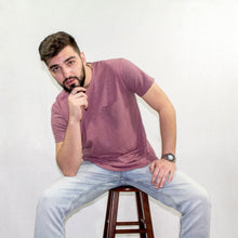 Load image into Gallery viewer, Male model wearing a Fauna purple hemp and organic cotton shirt. 
