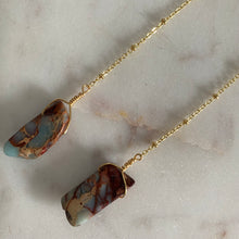 Load image into Gallery viewer, Fauna healing crystal jewelry long shoulder duster earrings made from an 18K gold plated chain with a Snakeskin Jasper crystal at the end, Snakeskin Jasper mini crystal at the top, and connected to 18K gold plated stainless steel french hook ear wires.
